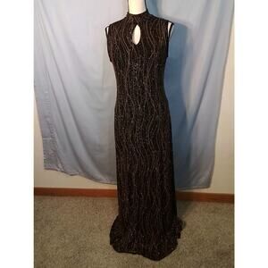 (Ronni Nicole ?) , Black dress with gold sequins